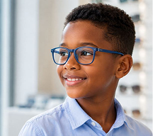 Boy wearing kids' glasses