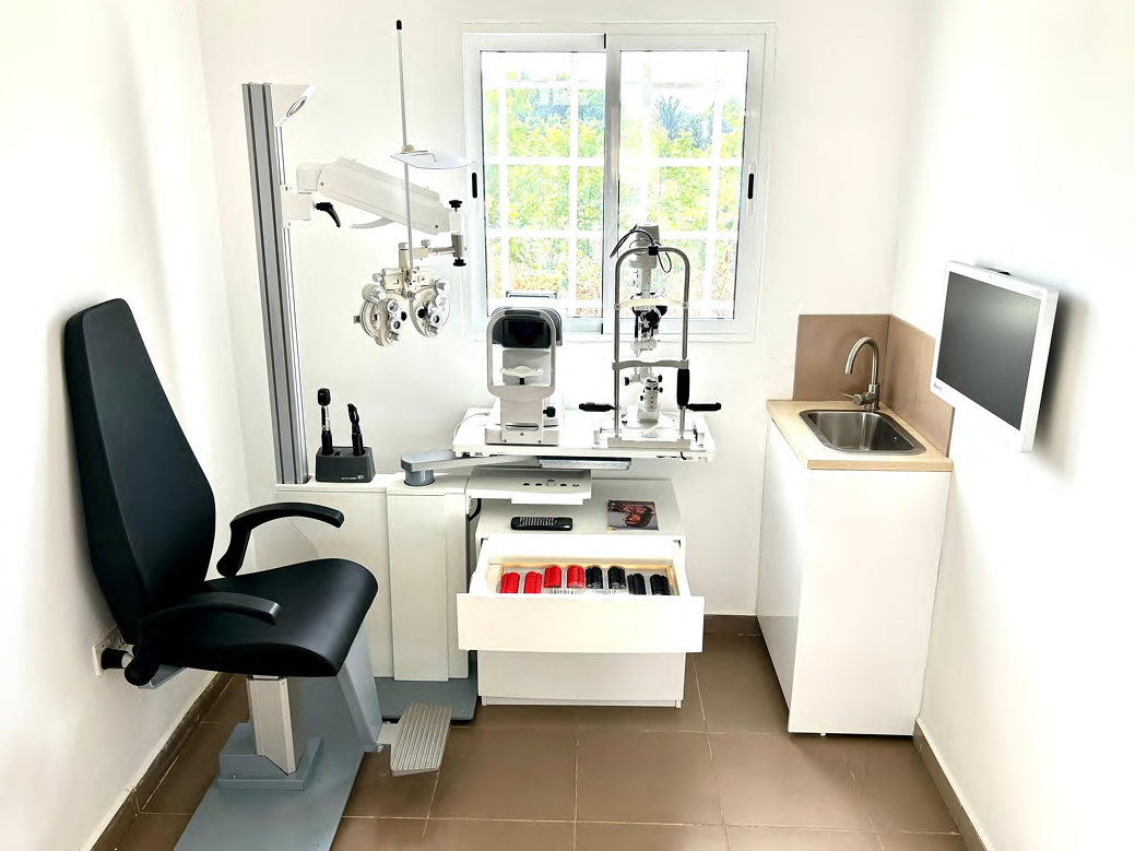 Eye examination room with phoropter and slit lamp